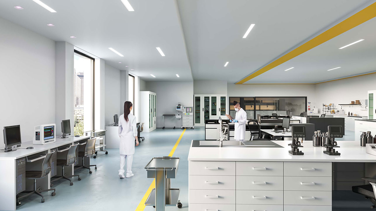 Lab technicians working in laboratory illuminated by HPL from Nightingale
